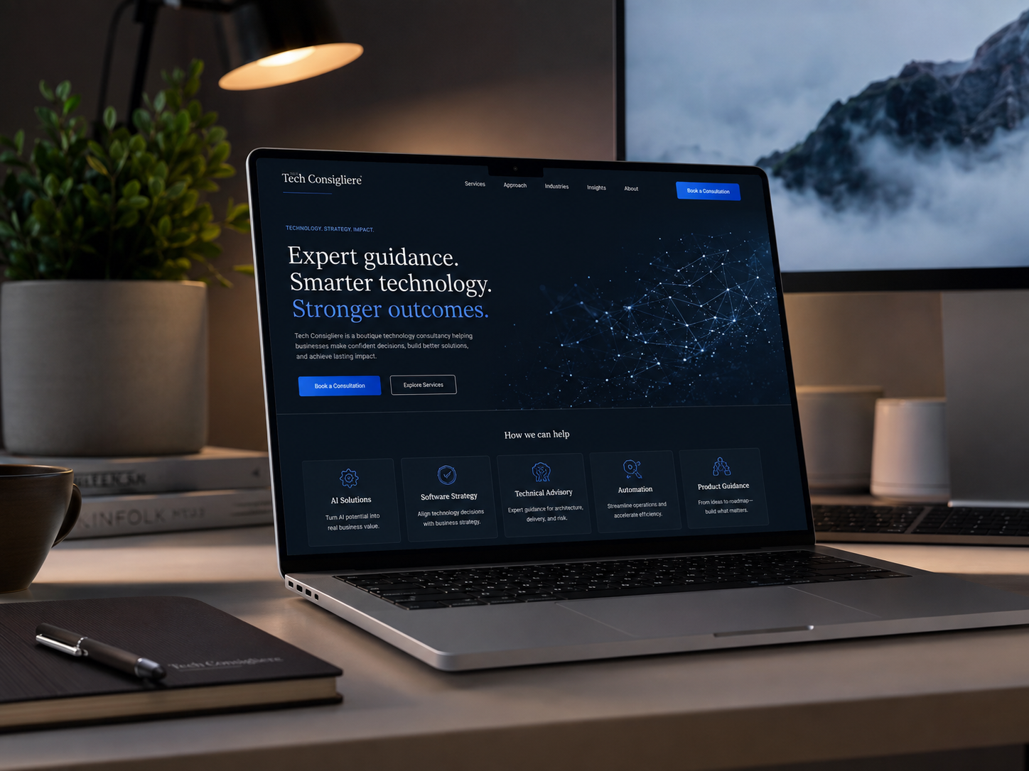 A finished Tech Consigliere website displayed on a laptop in a professional workspace.